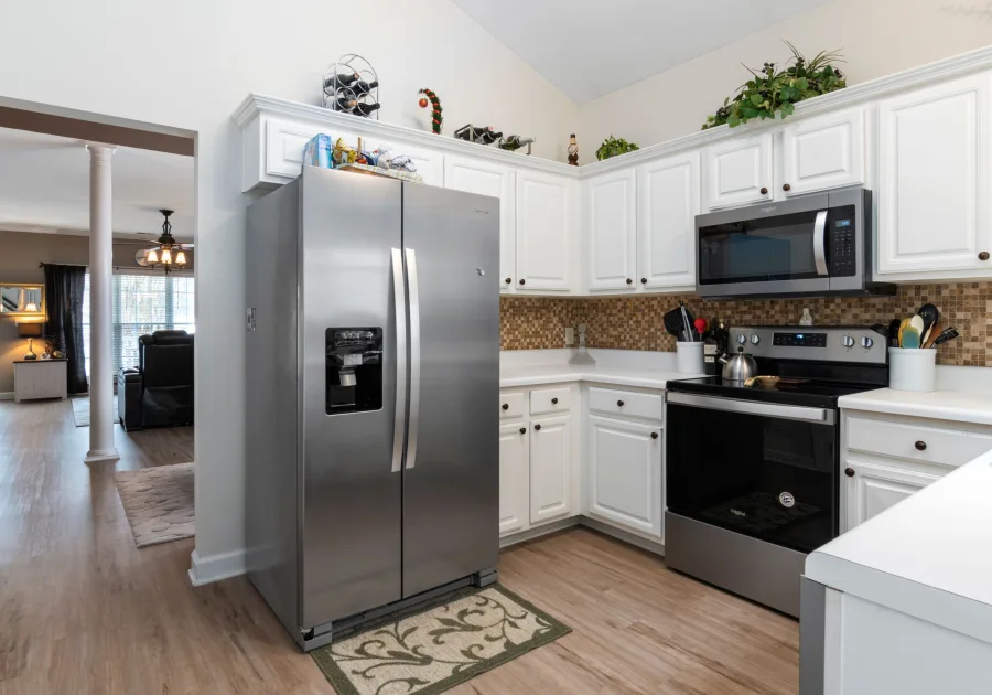 Stainless steel refrigerator in a bright modern kitchen